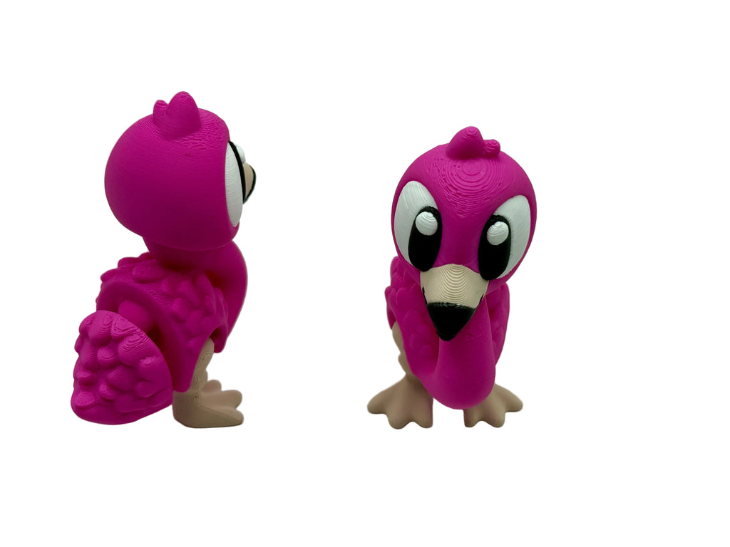 Two pink bird figurines on a white background