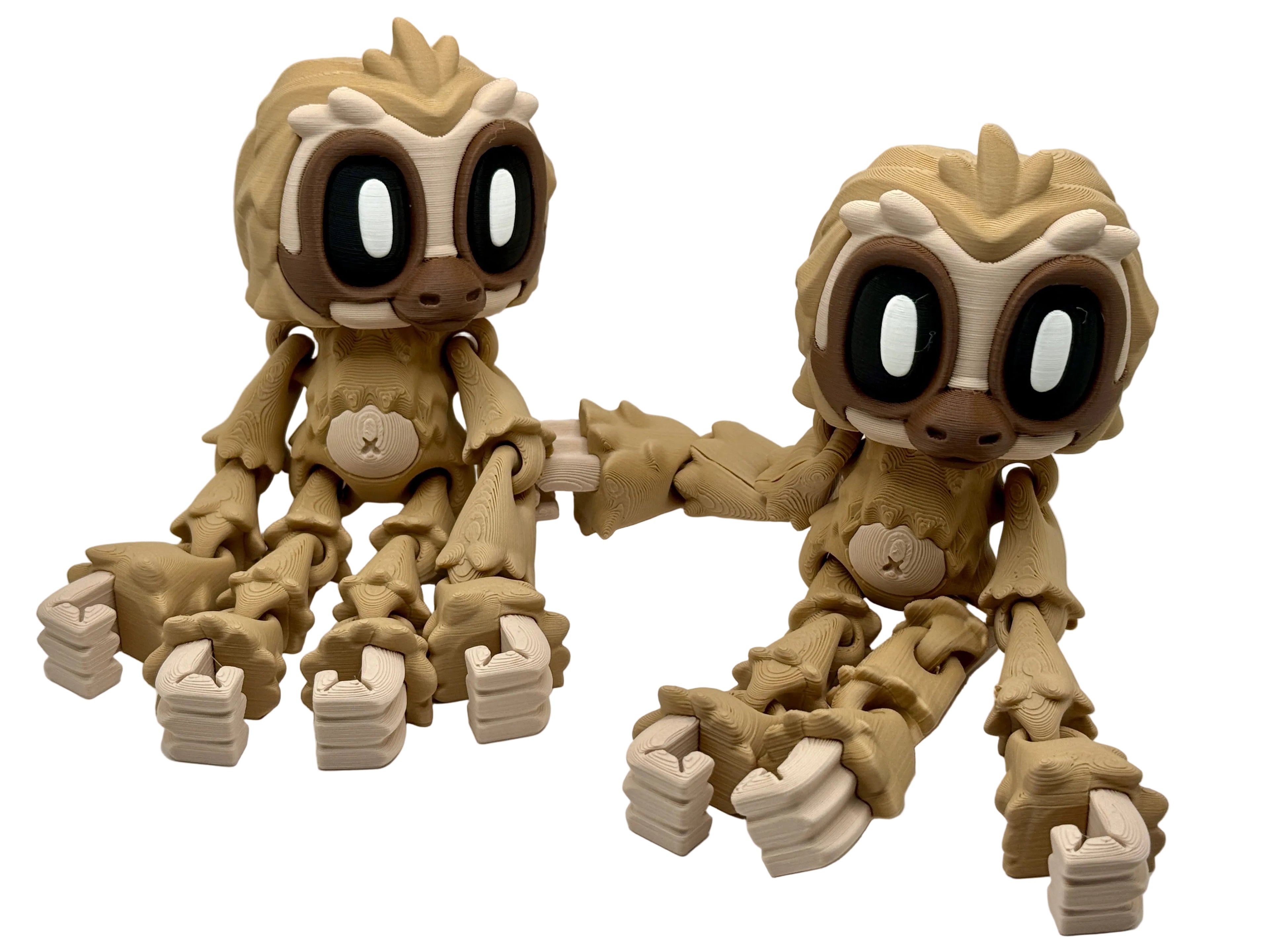 Two three-toed sloths on a white background