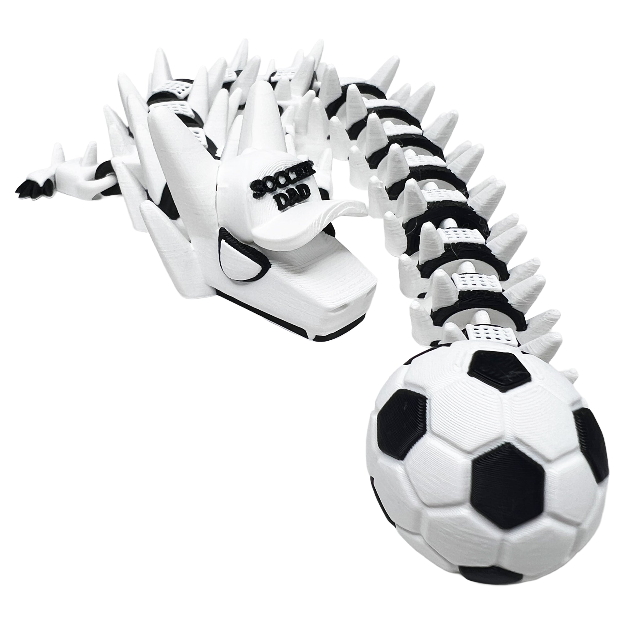 Global Cup Dragon 3D printed articulated soccer dragon toy
White soccer dragon with black soccer ball pattern details
3D printed soccer dragon collectible made in Oklahoma
Articulated soccer dragon with green cleats and trophy tail
Global Cup Dragon soccer player gift by Red Dirt Printing Co.
